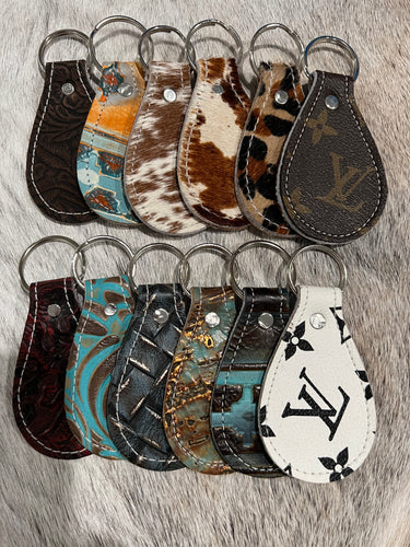 000-LIST OF LEATHER/HIDE KEY FOBS